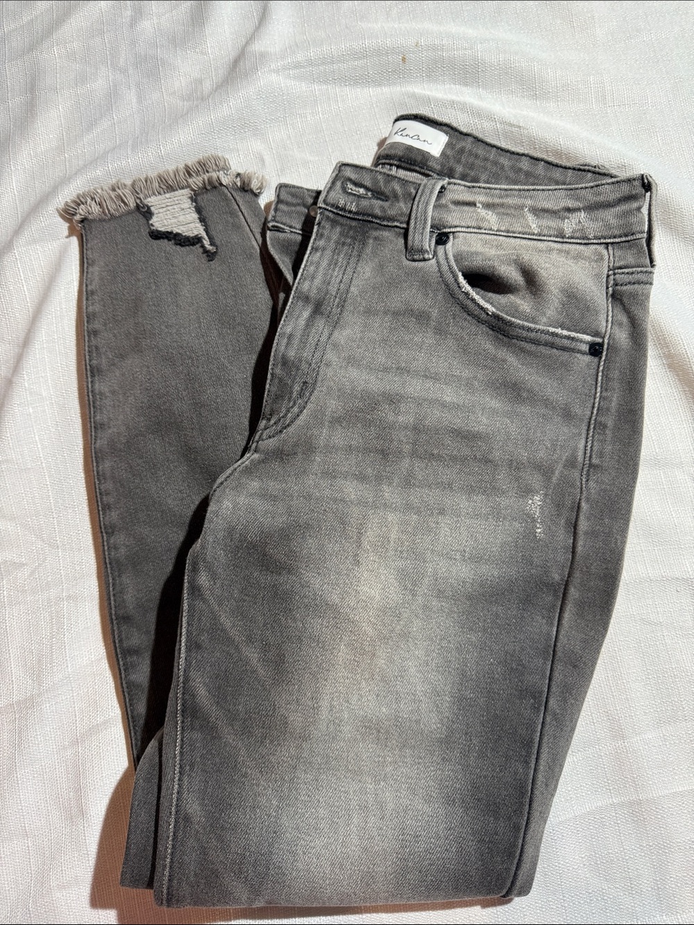 KanCan Women’s Gray Skinny Jeans with Frayed Hem